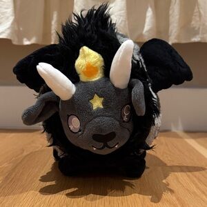 Plush Black and Gray Stuffed Animal with Horns